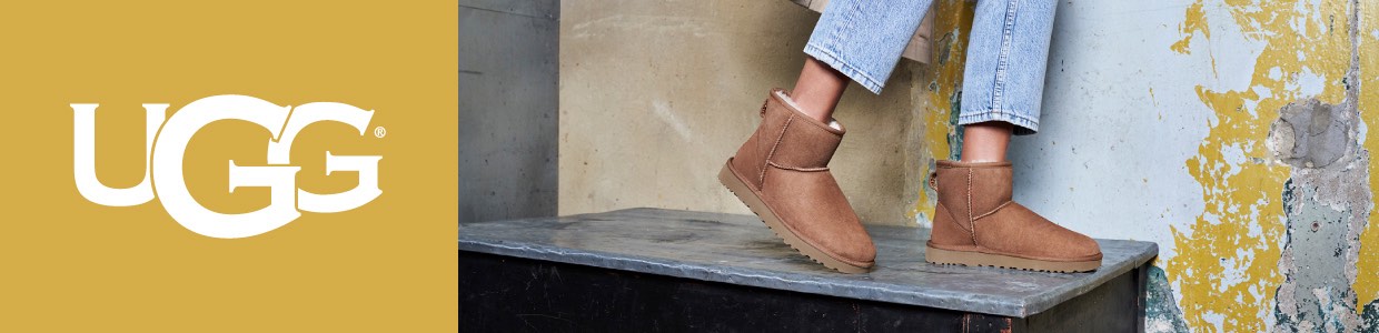 UGG-Boots auf Truhe vor abgesplitterter Wand